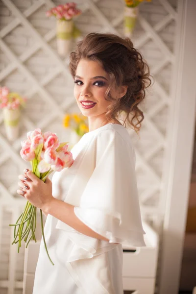 Fashionable attractive young woman in white dress in cafe in Provence style — Stock Photo, Image