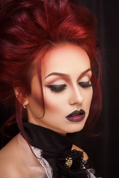 Sexy woman with gothic makeup and red hair — Stock Photo, Image