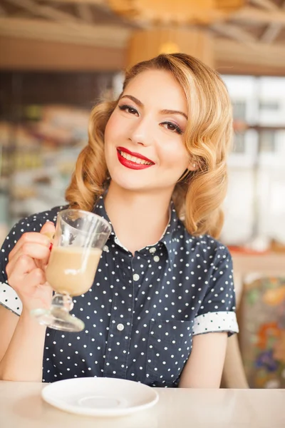 retro beautiful woman in restaurant cafe with coffee