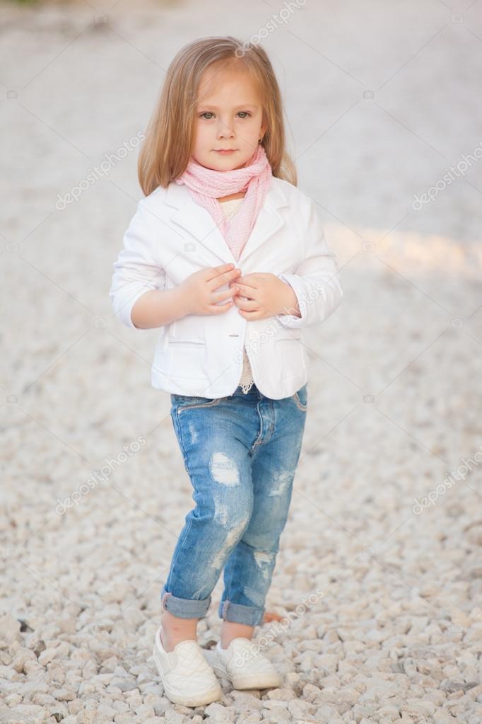 Beautiful trendy baby girl with blonde hair outdoors. Little girl 2-3 year  old Stock Photo by ©margo_black 74769525