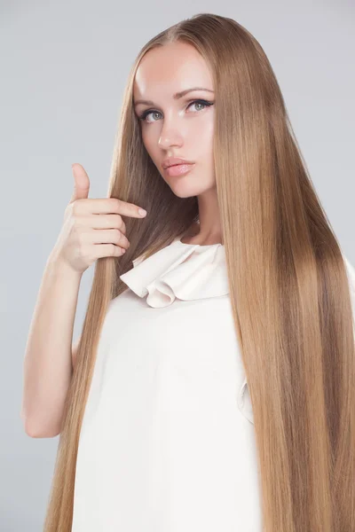 Beautiful hair, portrait of an young girl with short dress — Stock Photo, Image