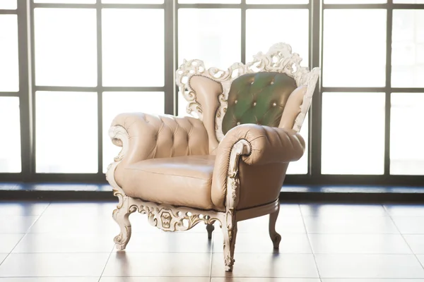 Beautiful Baroque armchair near a big window — Stock Photo, Image