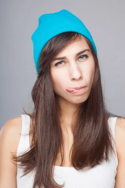 Young beautiful girl posing grimacing — Stock Photo, Image