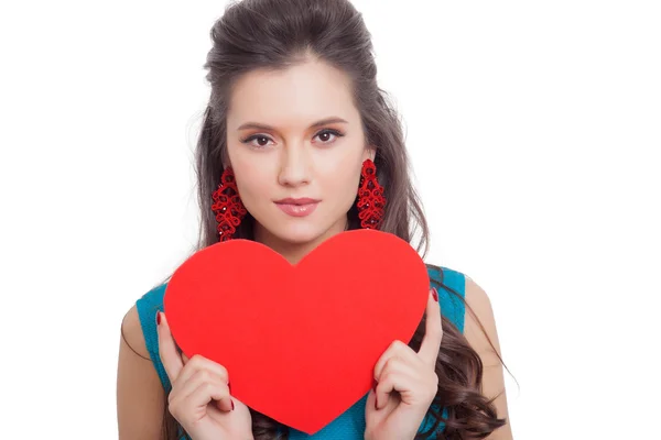 Valentine's Day. Beautiful smiling woman with a gift in the form of heart in his hands — Stock Photo, Image