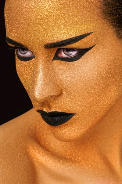 Golden Woman's Face Close up. Futuristic Gilded Make-up. Painted Skin — Stock Photo, Image