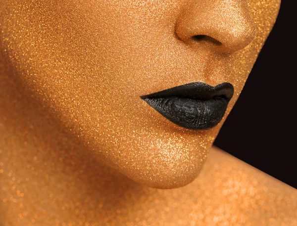 Golden Woman's Face Close up. Futuristic Gilded Make-up. Painted Skin — Stock Photo, Image