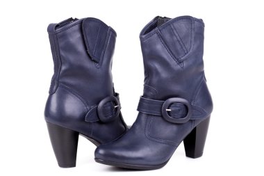 Studio, üzerinde beyaz izole atış şık deri çizmeler