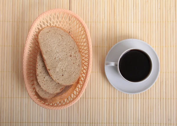 Taza de café y pan —  Fotos de Stock