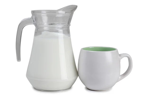 Leche en botella y taza — Foto de Stock