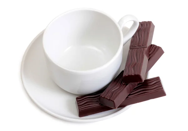 Coffee mug and chocolate — Stock Photo, Image