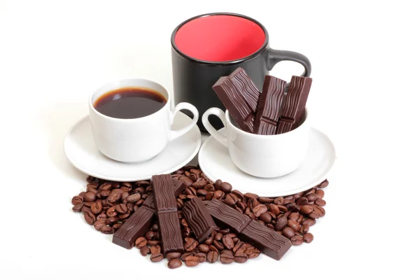 Coffee cups and chocolate — Stock Photo, Image