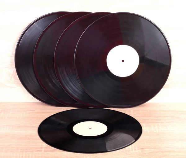 Ročníkové Vinylové Disky Dřevěném Pozadí — Stock fotografie