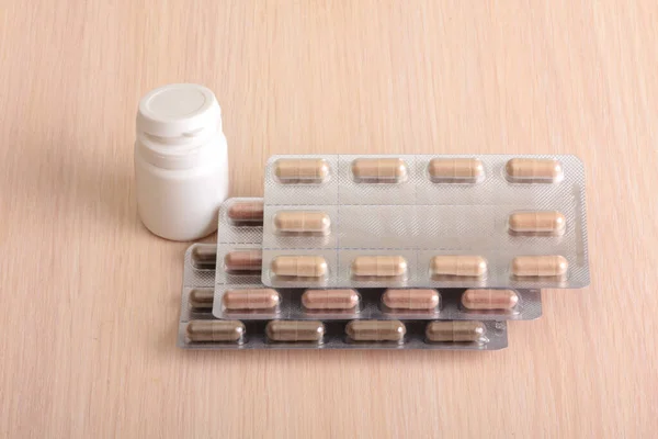 Medical pills in pack close-up on the table