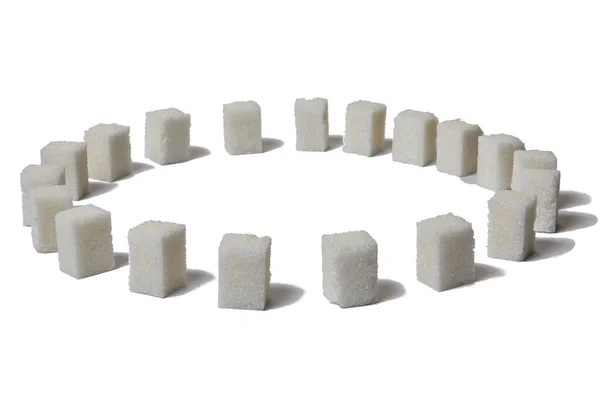 白い背景に白砂糖キューブの円 世界糖尿病デーの概念 — ストック写真