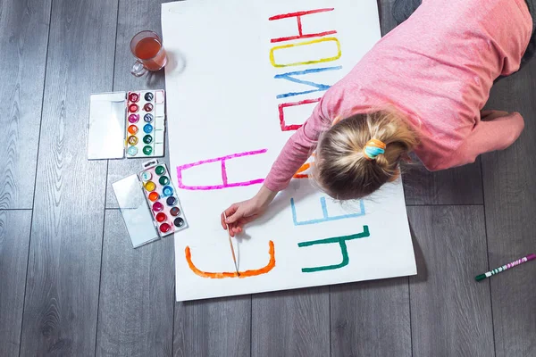 Top View Caucasian Girl Drawing Poster Colored Paints White Paper — Stok fotoğraf