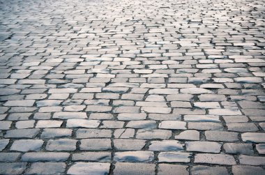 Eski kaldırım taşları, granit taşın sokak dokusu.
