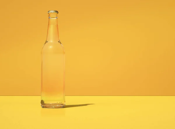 3D illustration of transparent glass beer bottle against yellow background. Illuminated from left side.