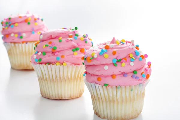 Tres cupcakes con chispas — Foto de Stock