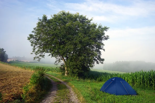 Tent and road — Stock Photo, Image