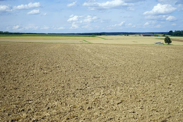 Geploegd landbouwgrond — Stockfoto