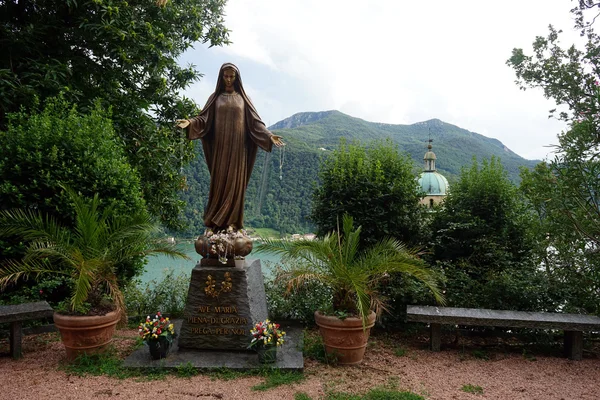 Madonna near tower — Stock Photo, Image