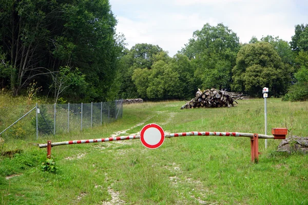 Barrier and logs — Stock Photo, Image