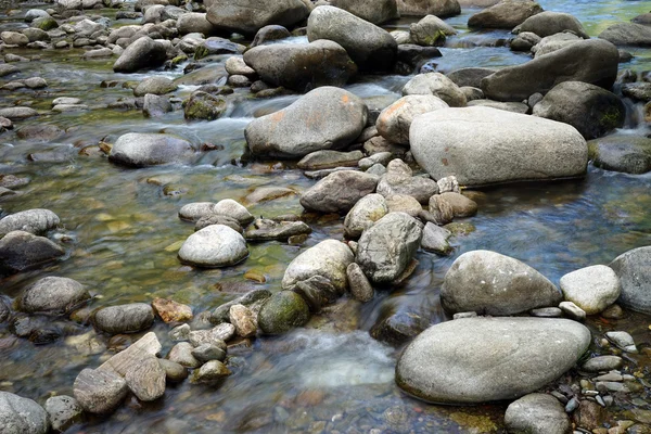 Boulders and smooth river in France — Stock Photo, Image