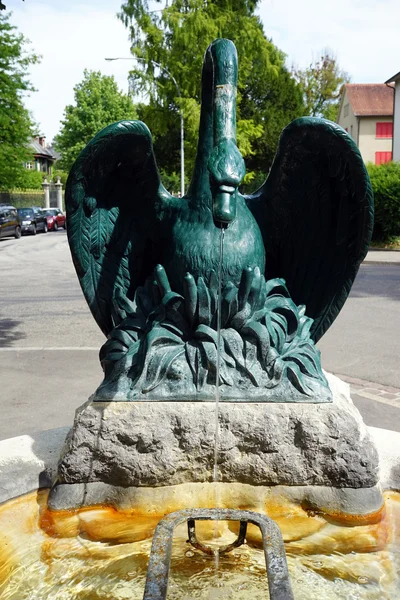 Fountain with bronze basilisk — Stock Photo, Image