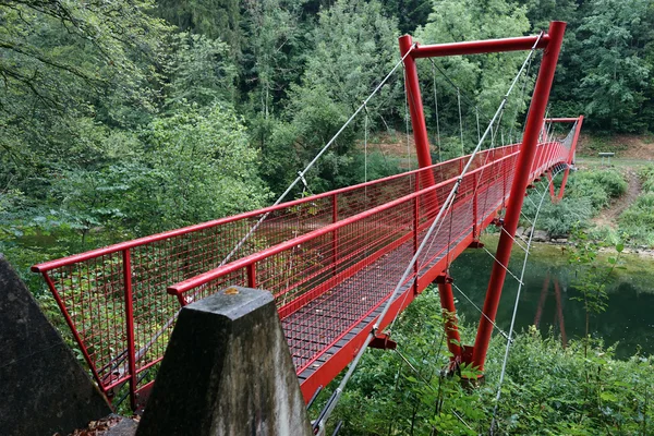 Red bridge and river — Stock Photo, Image