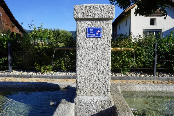 Stone fountain in Switzerland — Stock Photo, Image