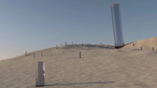 Glass cylinders in the sand — Stock Photo, Image