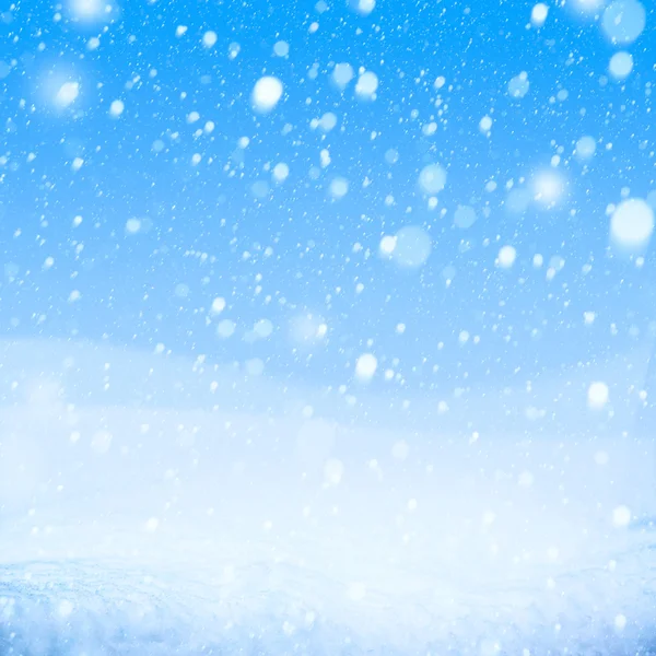 Art falling snow on the blue background — Stock Photo, Image