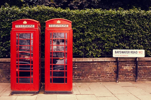 Art row of traditional phone boxes in London city — Stock Photo, Image