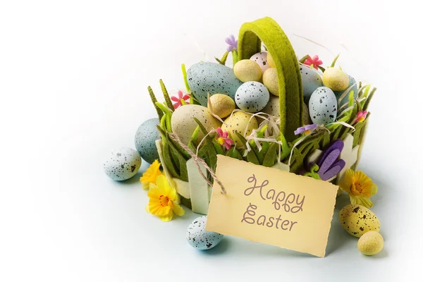 Art Easter eggs basket on wooden background — Stock Photo, Image