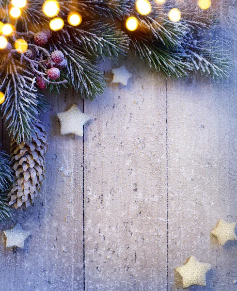 Umění Vánoční pozadí s větvičky jedle a zlatých hvězd — ストック写真