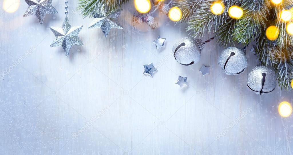 art Christmas background with a silver ornament, christmas stars