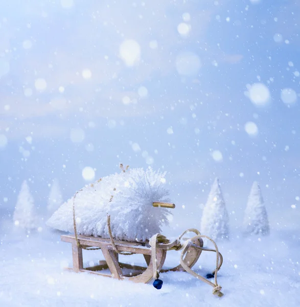 Arte decoración de Navidad sobre fondo de nieve azul — Foto de Stock
