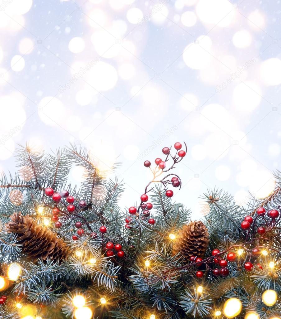 Art Christmas tree light; Christmas Background With  Fir Branch 