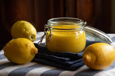 Lemon curd in the glass jar. Ketogenic diet recipe for healthy eating