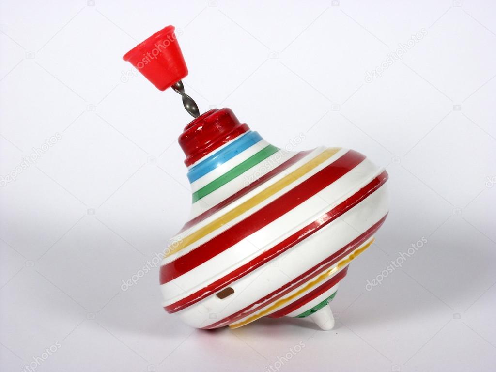 Old plastic toy whirligig with red handle