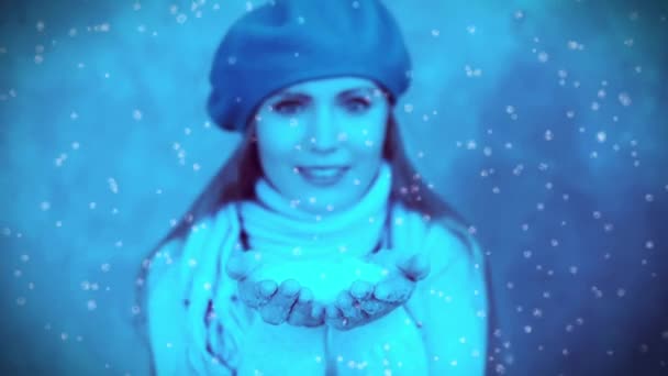 Woman blowing snow — Stock Video