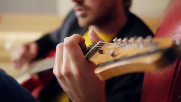 Male hands on guitar — Stock Video