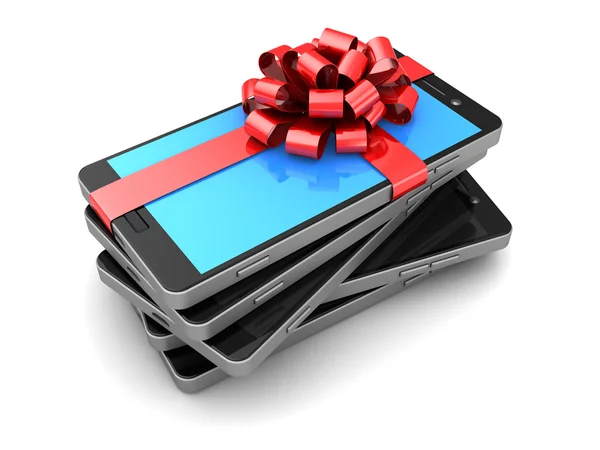 Smartphones met cadeau lint — Stockfoto