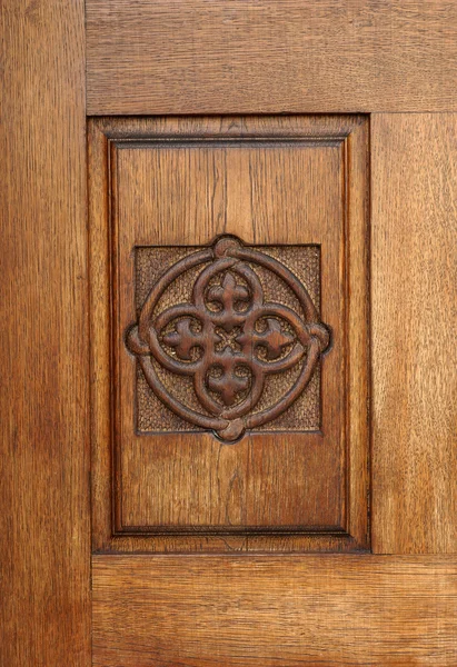 Wooden carvings on door — Stock Photo, Image