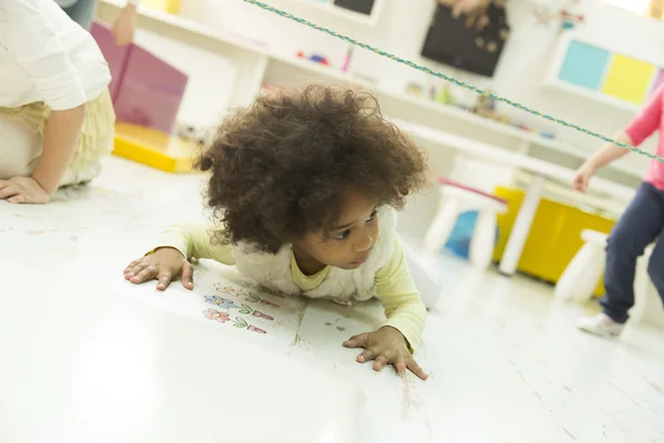 Little african girl at the playroom — Stock Photo, Image