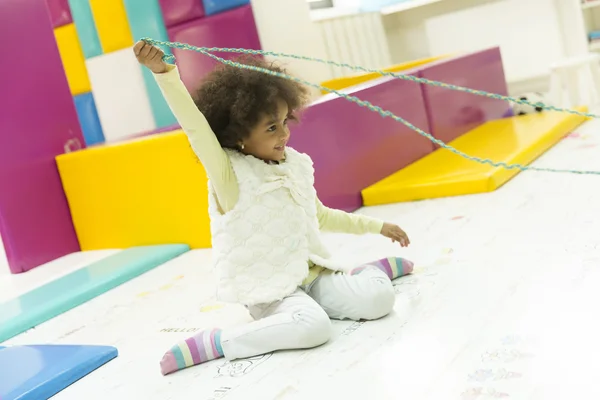 Little african girl at the playroom — Stock Photo, Image