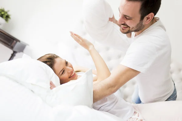 Loving couple in bed — Stock Photo, Image