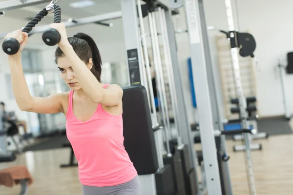 Pretty woman in the gym — Stock Photo, Image