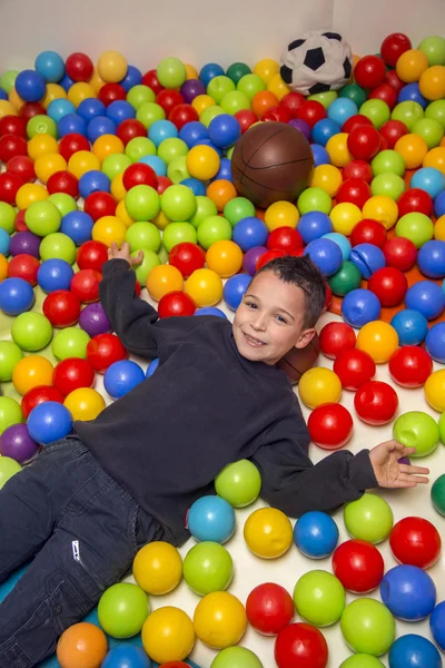 Menino no parque infantil — Fotografia de Stock