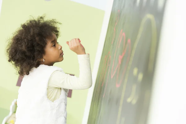 Little girl in the kindergarden — Stock Photo, Image